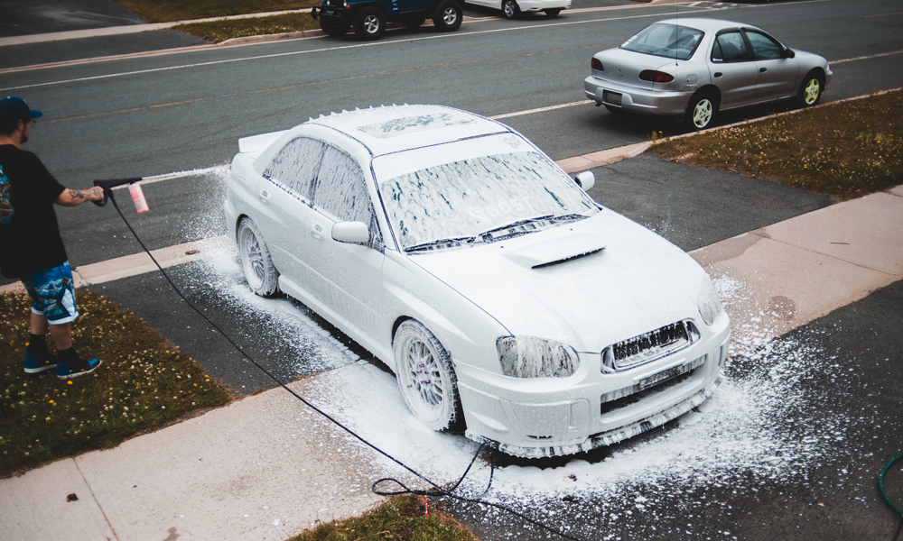 Car covered in soap foam
